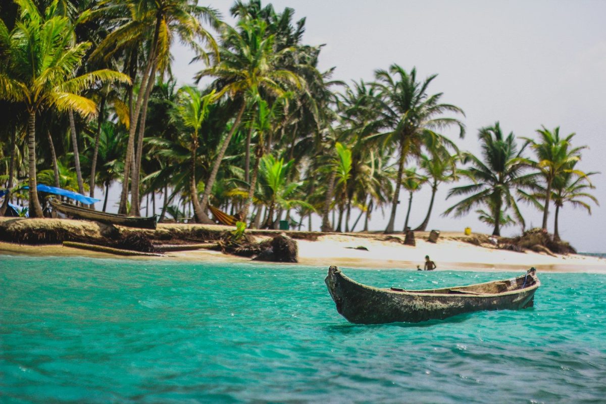 15 Great Places Around the World to Enjoy Retirement 6 canoe on beach