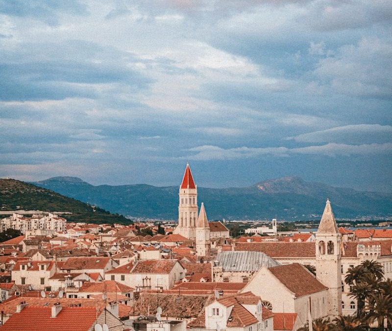 a view of a city with a clock tower