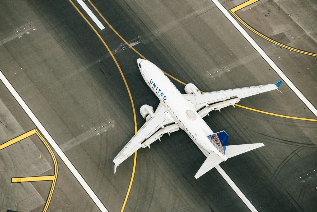7 Tricks for Finding the Best Airfare Deals in 2026 5 white and blue airplane on airport during daytime