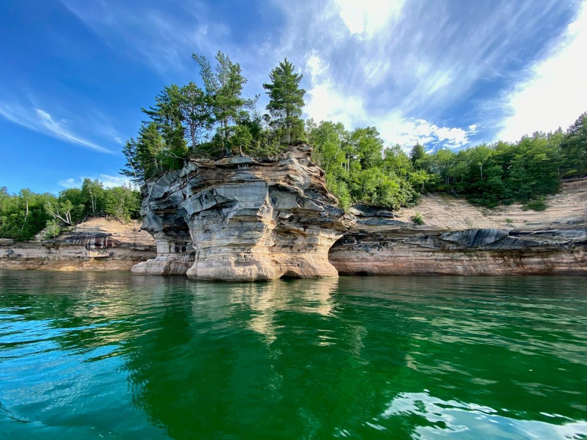 8 Must-Visit Lake Destinations in the U.S. for Summer Travelers 4 green trees beside river under blue sky during daytime
