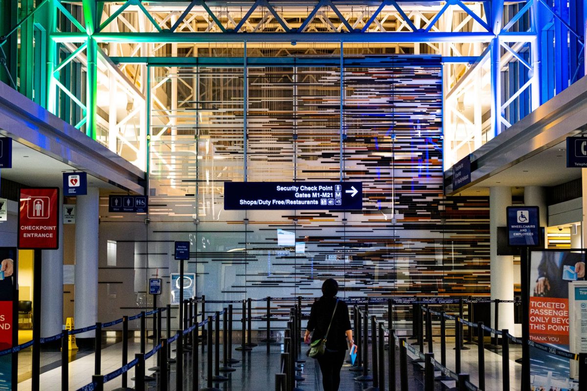 A traveler enters the security checkpoint at O&amp;#39;Hare Airport terminal, Chicago.