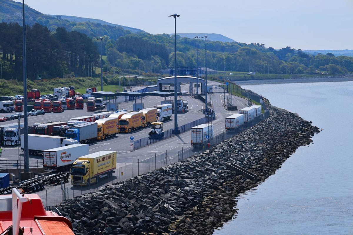 Aerial view of freight trucks at Cairnryan port terminal in Scotland.
