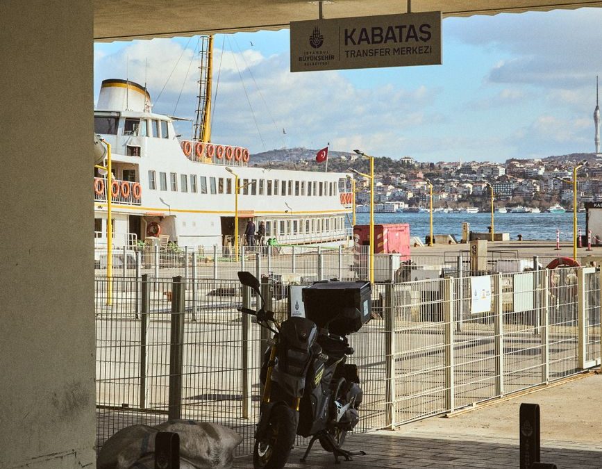 Scenic view of Bosphorus ferry with motorcycle at Kabatas terminal, Istanbul.
