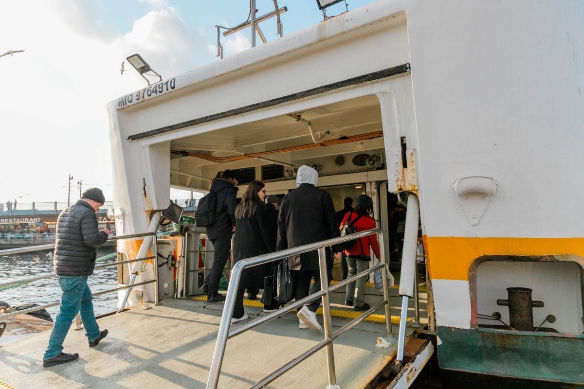 Passengers boarding a ferry for a daily commute across a bustling city&amp;amp;#39;s harbor.