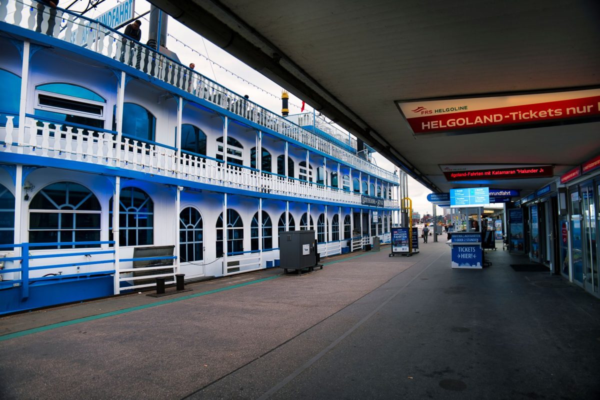 Scenic view of ferry and terminal at Hamburg harbor.