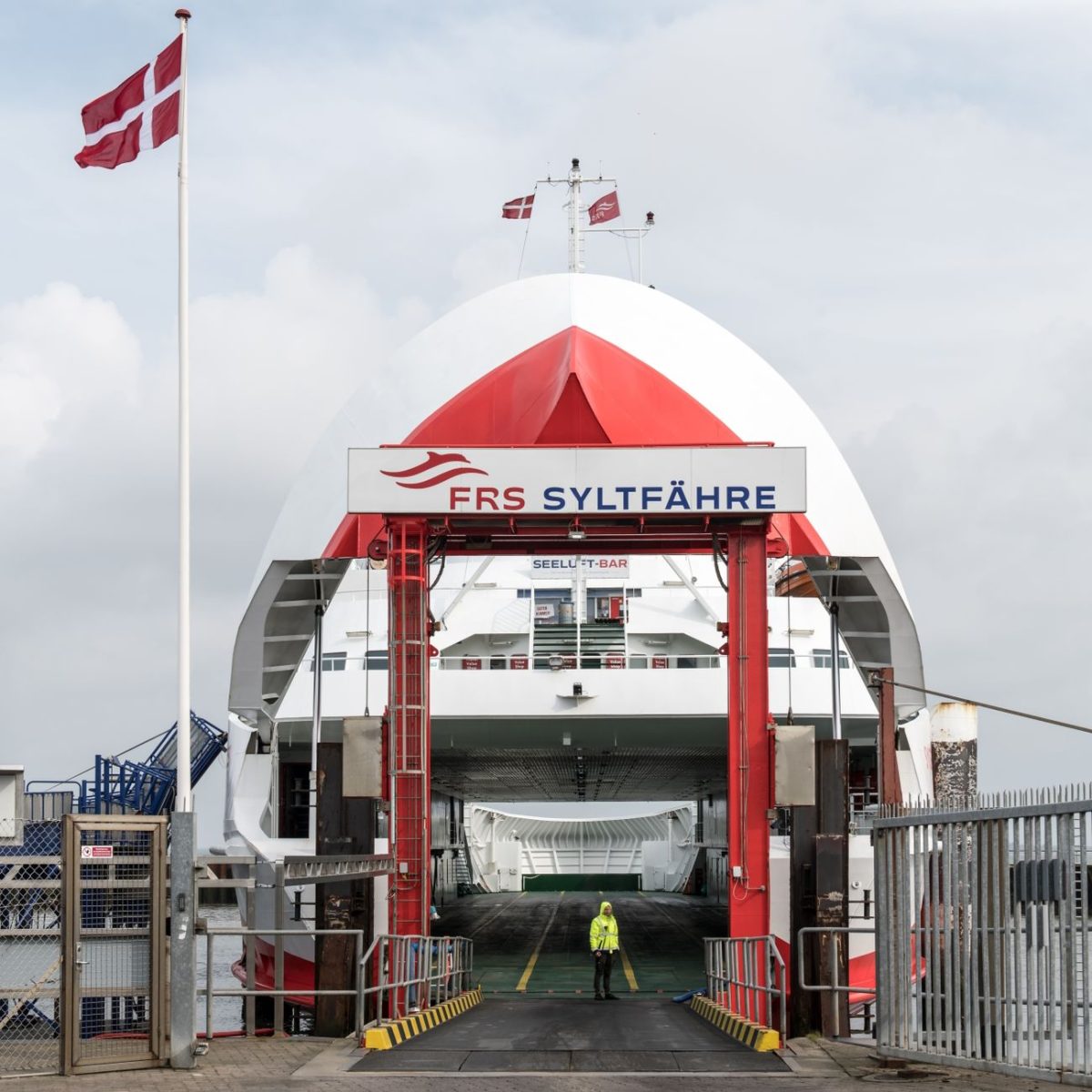 Passenger ferry docked at Rømø, Denmark. Ideal for travel and nautical themes.